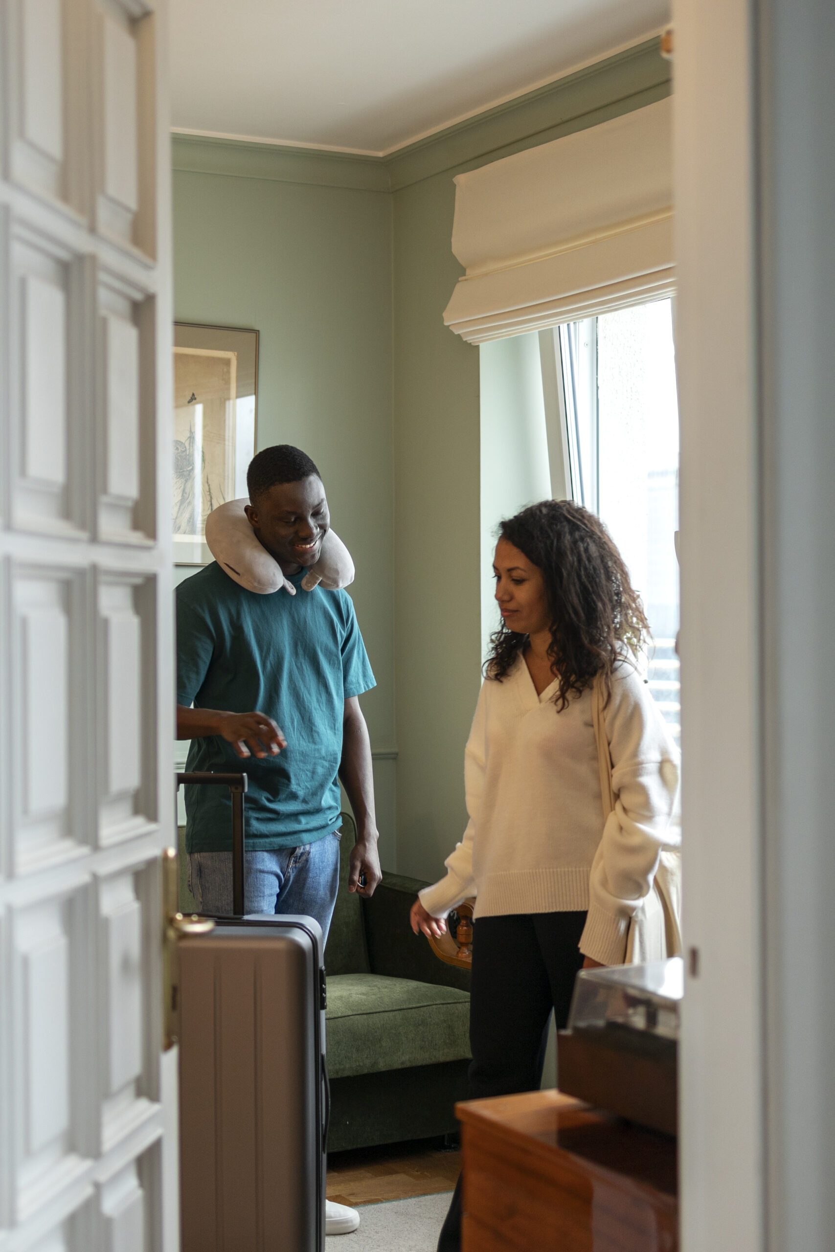 airbnb host welcoming guests scaled